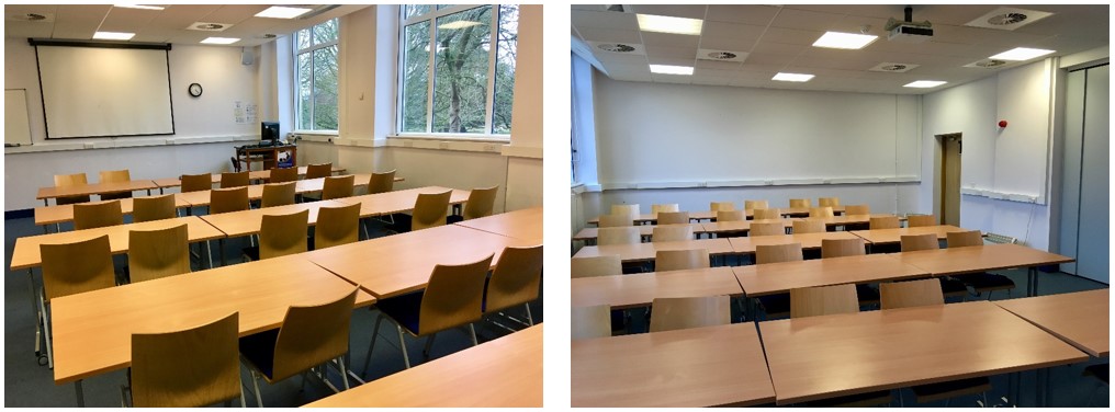 Rows of tables and chairs facing teaching wall.